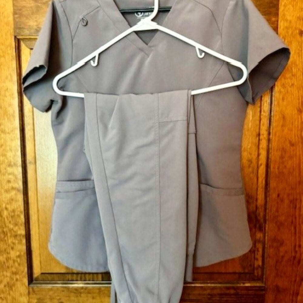Various colored scrub sets, all size S and XS